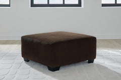 Kimlee Chocolate 3-Piece Sectional and Ottoman - Ornate Home
