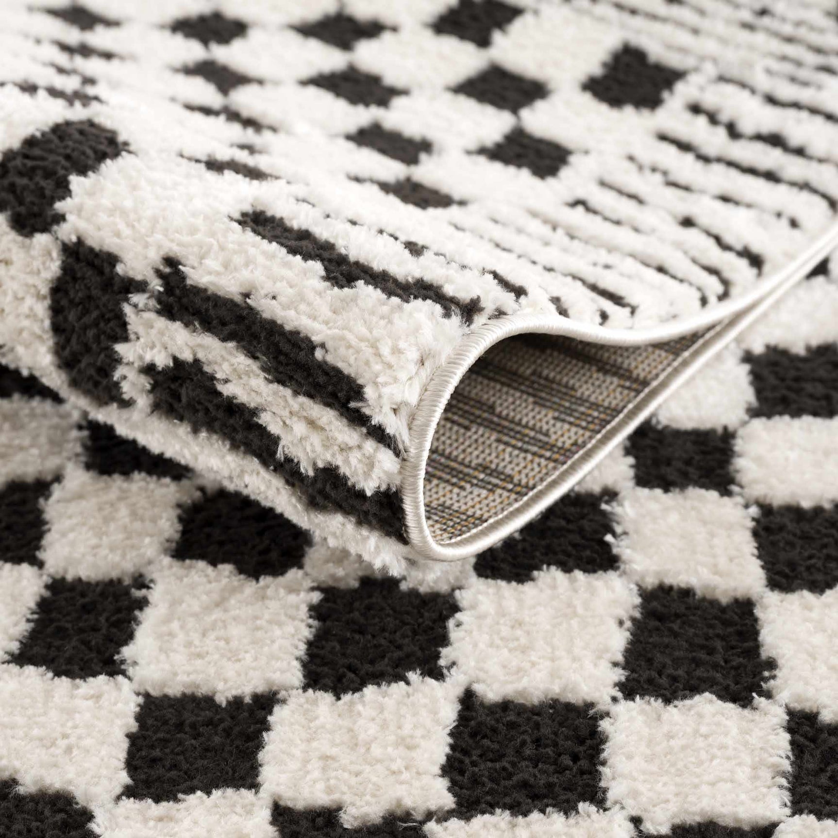 Leryn Black & White Checkered Area Rug - Ornate Home