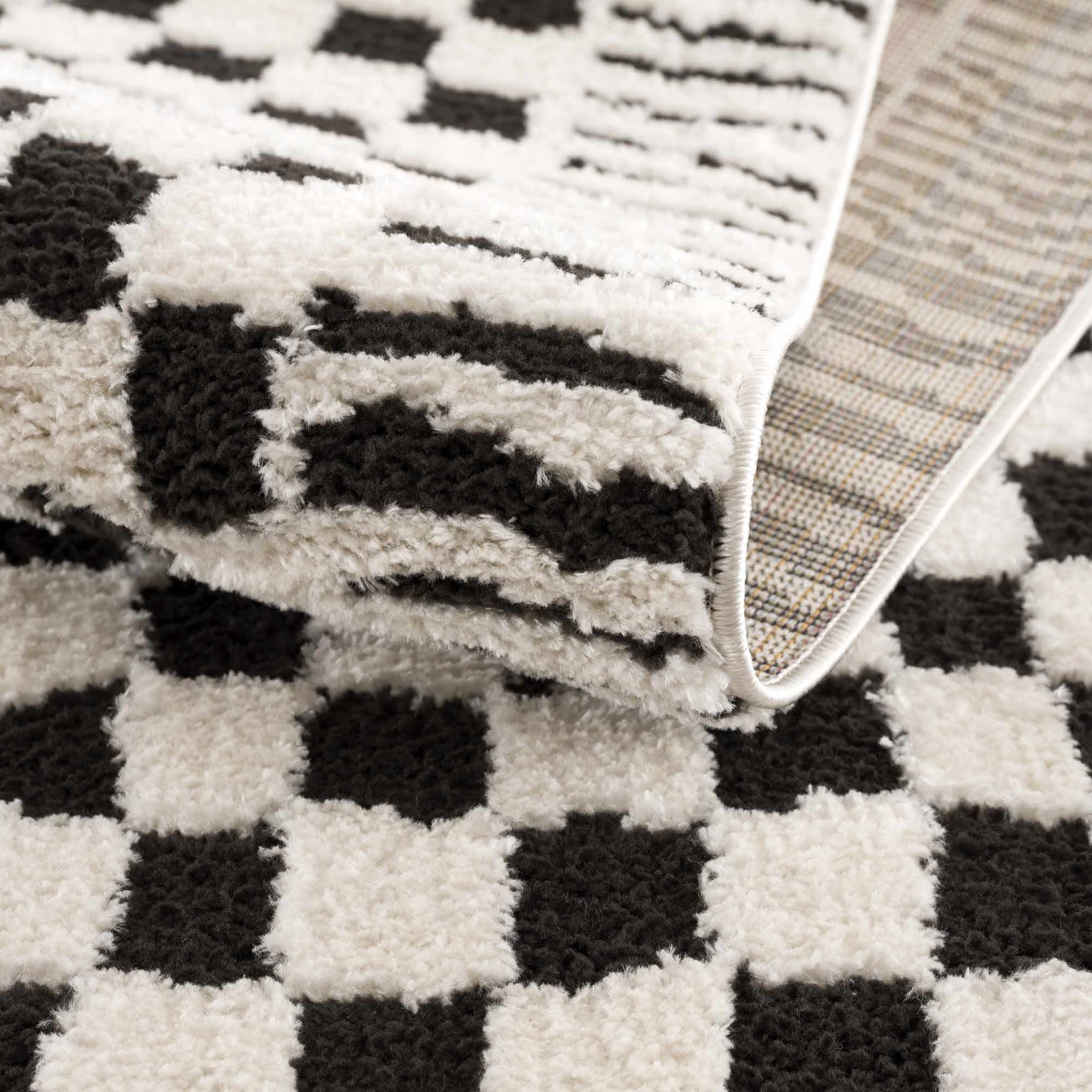 Leryn Black & White Checkered Area Rug - Ornate Home