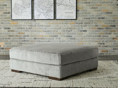 Lindyn Fog 4-Piece Sectional and Ottoman - Ornate Home