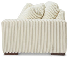 Lindyn Ivory 2-Piece Sectional, Chaise and Oversized Ottoman - Ornate Home