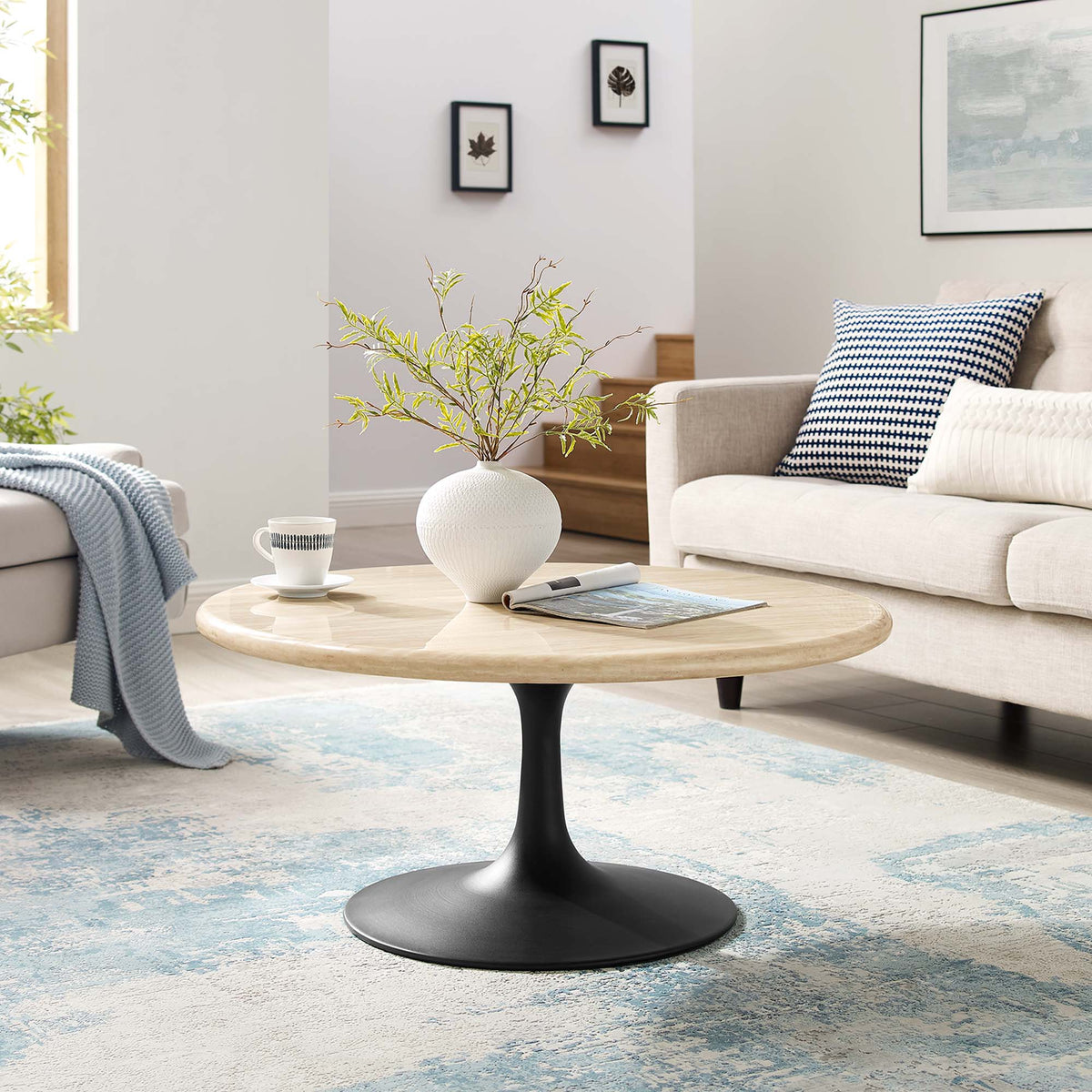 Lippa Black 36" Round Faux Travertine Coffee Table - Ornate Home