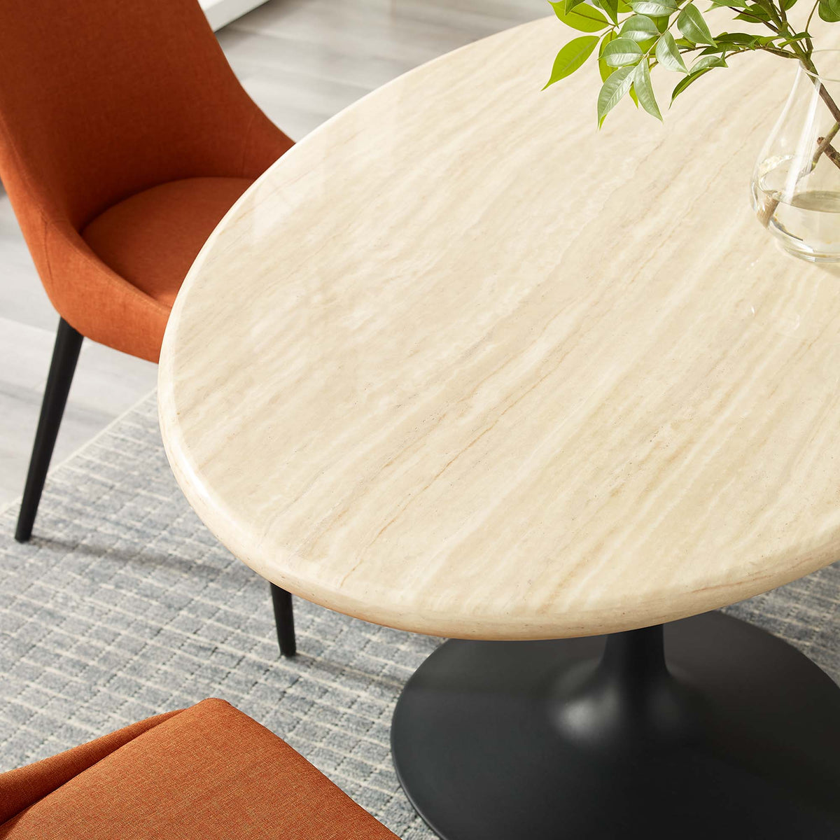 Lippa Black 60" Oval Faux Travertine Dining Table - Ornate Home