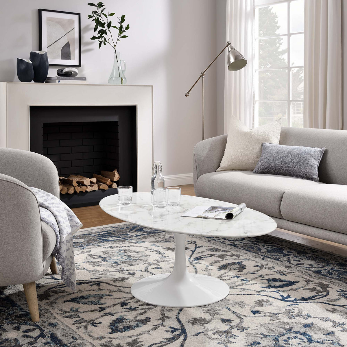 Lippa White 48" Oval Faux Marble Coffee Table - Ornate Home