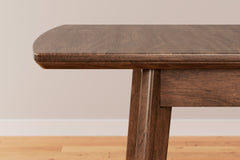 Lyncott Brown Dining Table w/ Extension (64" D) - Ornate Home