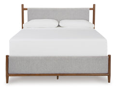 Lyncott Brown Queen Upholstered Bed with Mirrored Dresser and Chest (Online Special Price) - Ornate Home