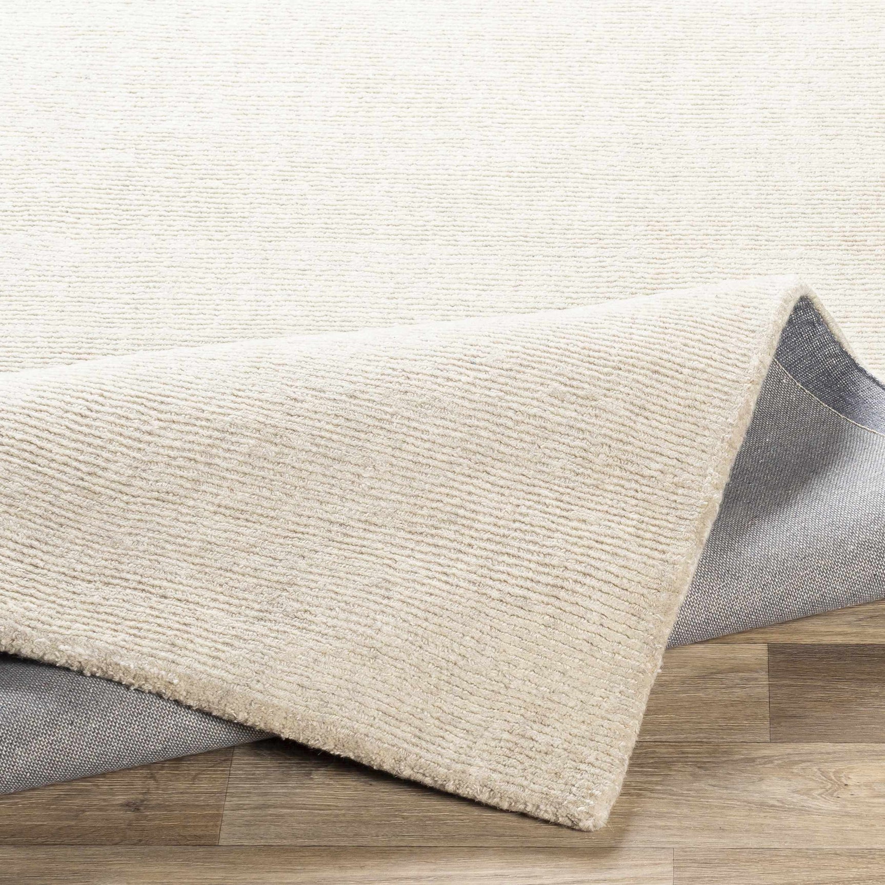 Mariba Ivory Wool Area Rug - Ornate Home