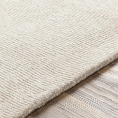 Mariba Ivory Wool Area Rug - Ornate Home