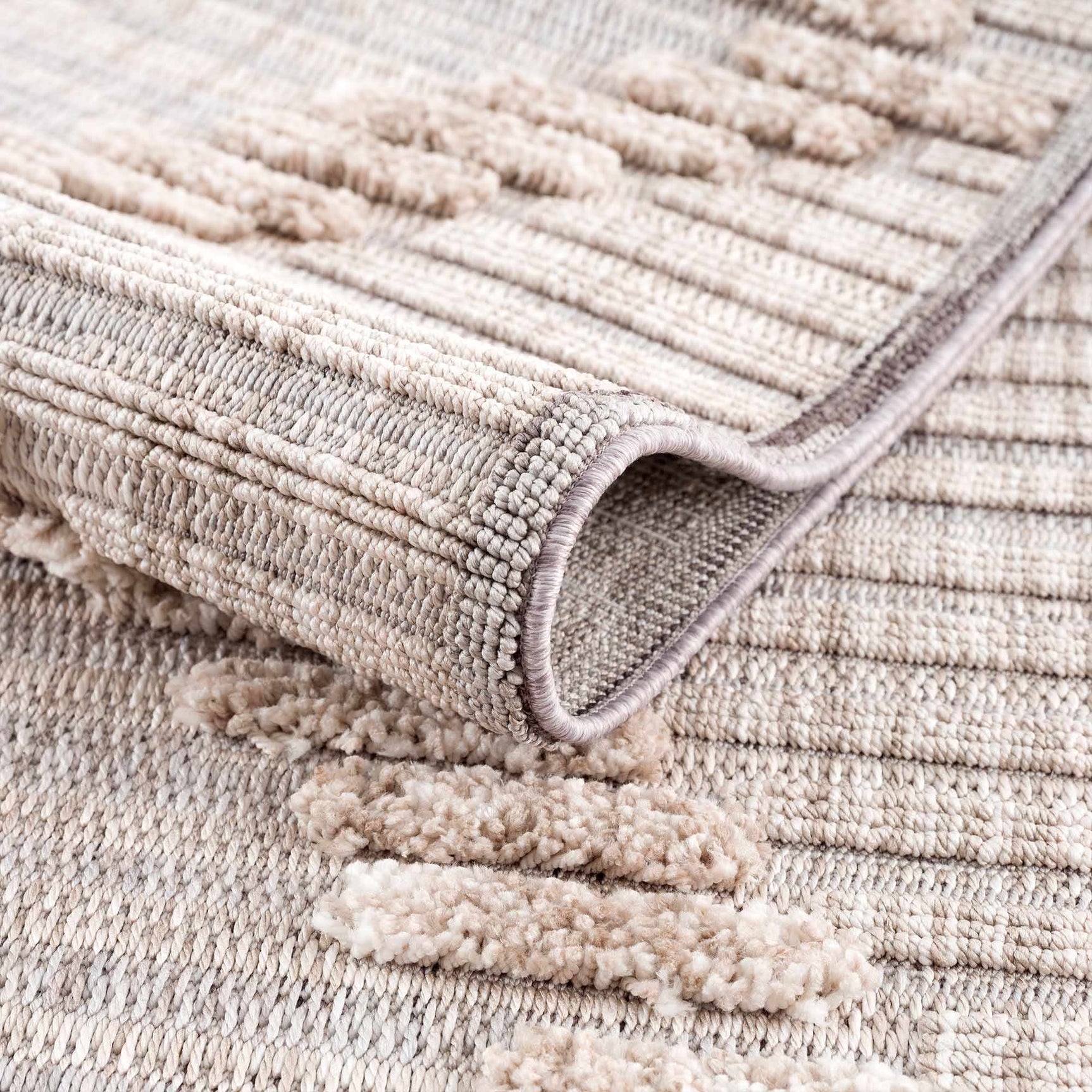 Maulawin Cream High-Low Area Rug - Ornate Home