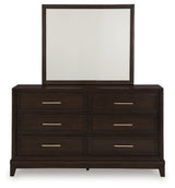 Neymorton California King Upholstered Panel Bedroom Set with Dresser and Mirror - Ornate Home
