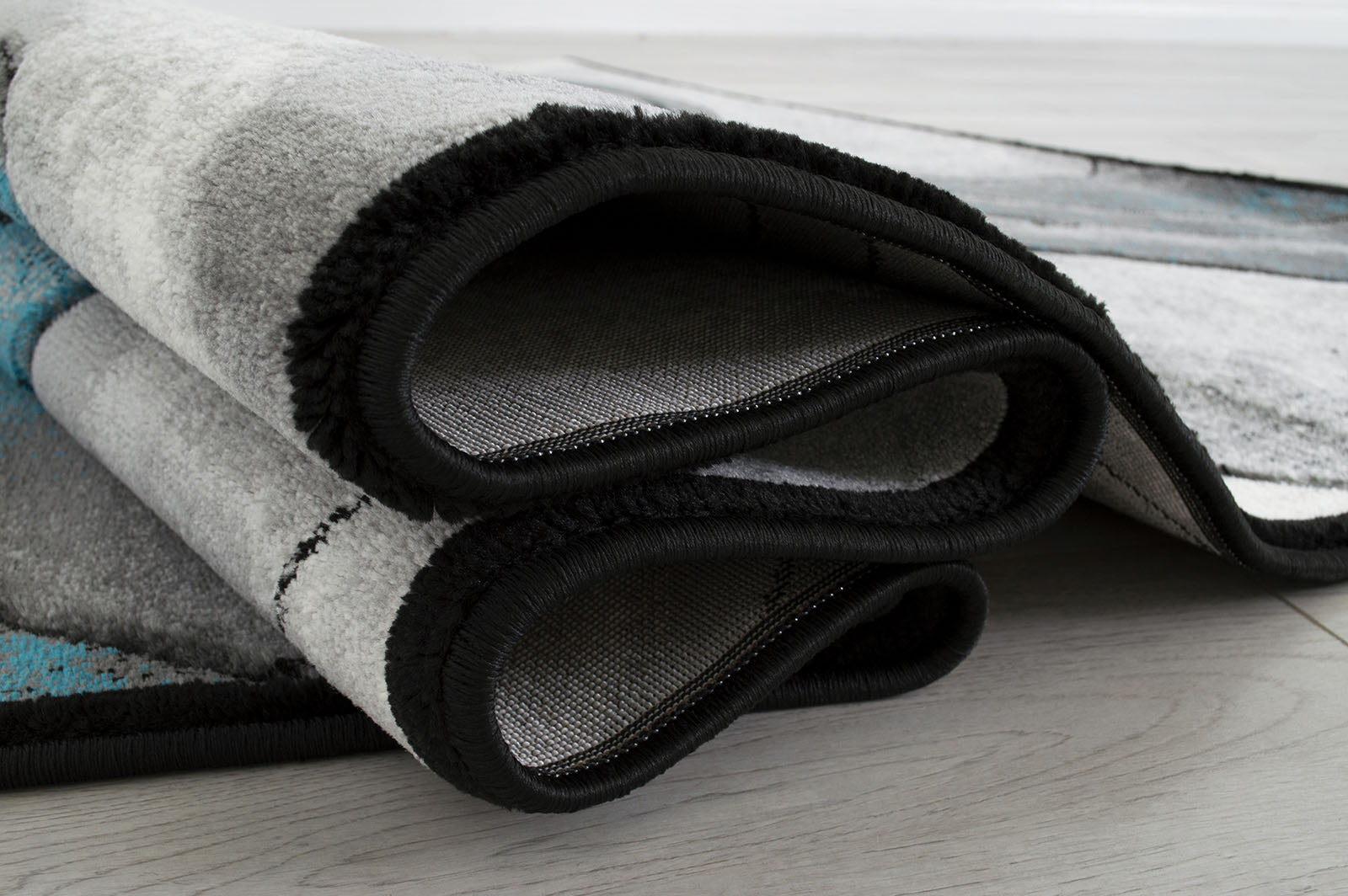 Niksar Turquoise 5' X 7' Area Rug - Ornate Home