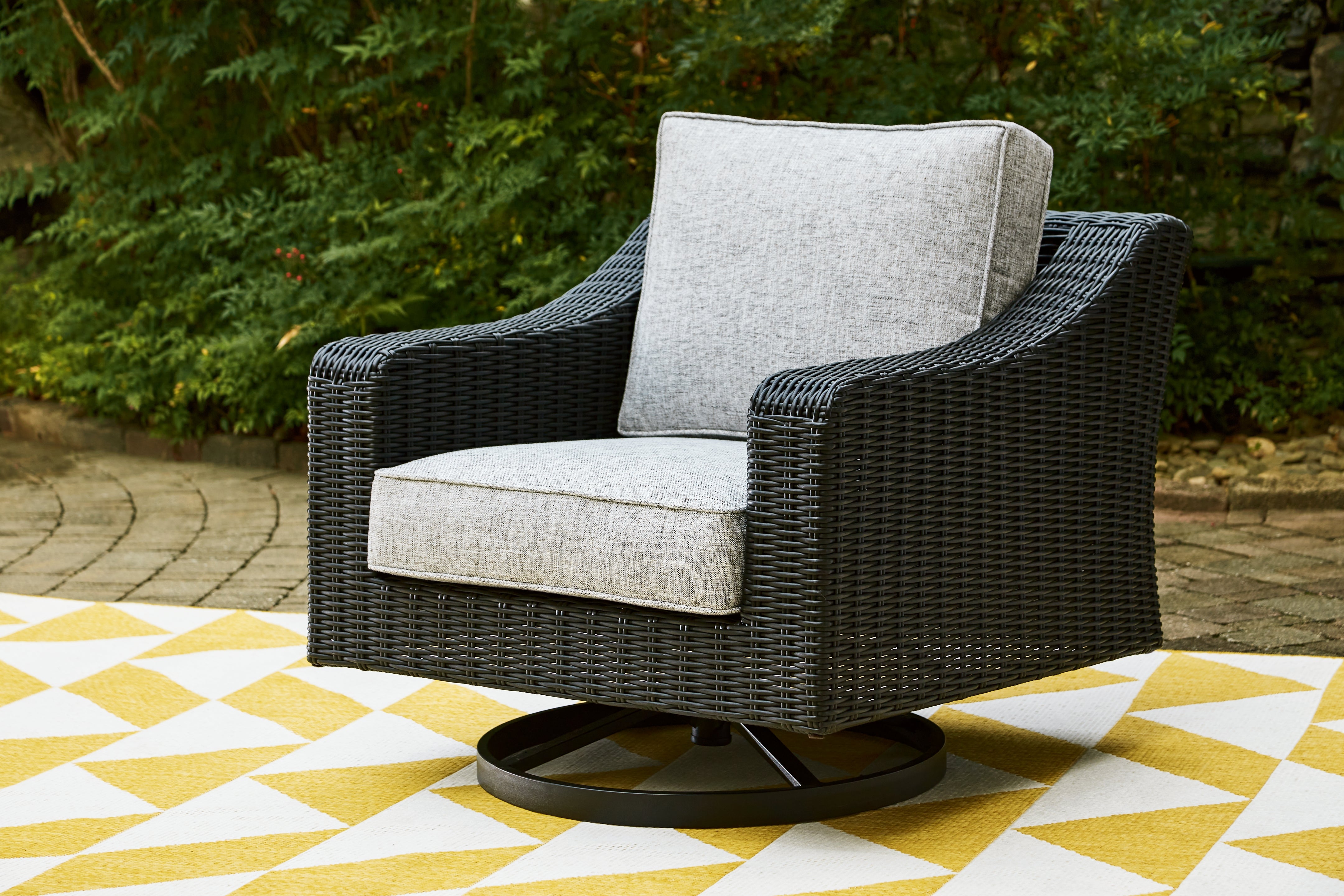 Beachcroft Black/Light Gray Outdoor Swivel Lounge with Cushion - Ornate Home