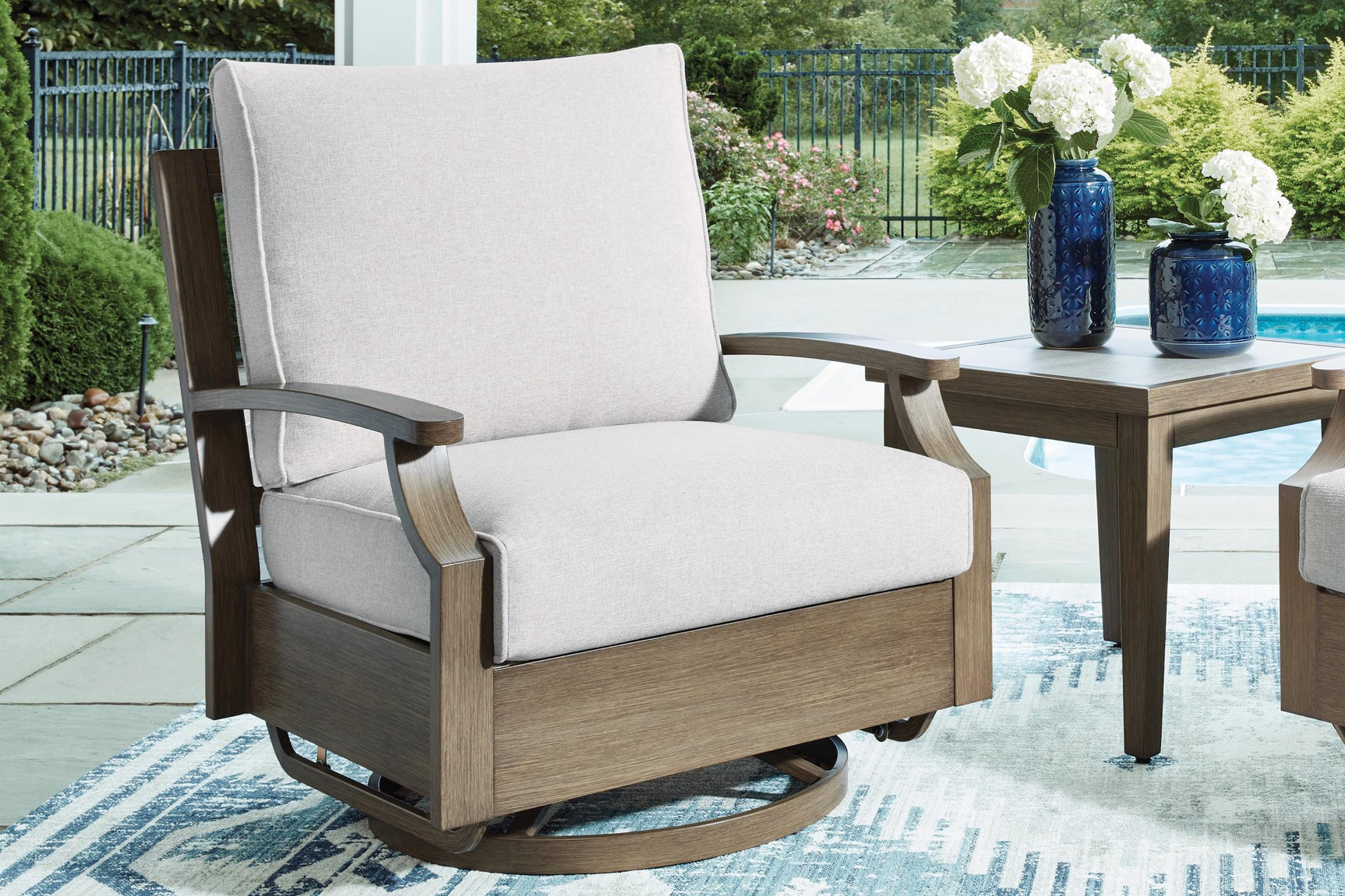 Rainier Ranch Brown/Beige Outdoor Swivel Glider Chair with Cushion - Ornate Home