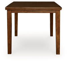 Ralene Medium Brown Counter Height Dining Table and 4 Barstools - Ornate Home