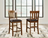 Ralene Medium Brown Counter Height Dining Table and 4 Barstools - Ornate Home