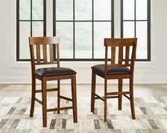 Ralene Medium Brown Counter Height Dining Table and 4 Barstools - Ornate Home