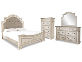Realyn Chipped White King Panel Upholstered Bedroom Set with Dresser, Mirror and Chest - Ornate Home