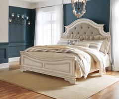 Realyn Chipped White King Panel Upholstered Bedroom Set with Dresser, Mirror and Chest - Ornate Home