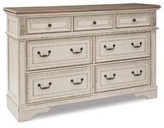 Realyn Chipped White King Upholstered Sleigh Bed, Dresser and Nightstand - Ornate Home