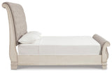 Realyn Chipped White King Upholstered Sleigh Bed, Dresser and Nightstand - Ornate Home