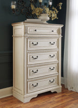 Realyn Two-tone King Panel Bed, Dresser, Mirror, Chest and Nightstand - Ornate Home
