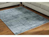 Rhysill Teal 5' x 7' Rug - Ornate Home