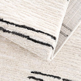 Riad Black Striped White Rug with Tassels - Ornate Home