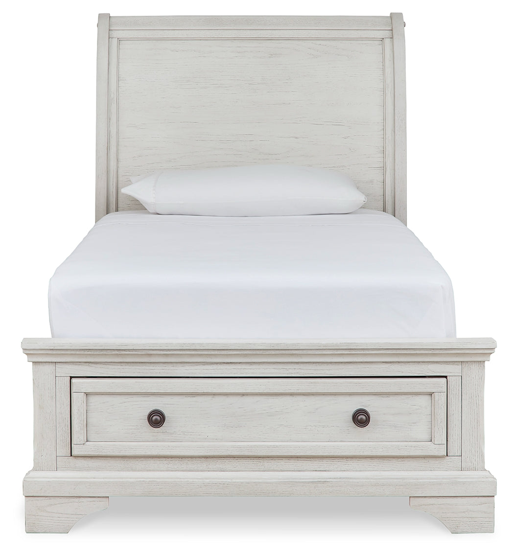 Robbinsdale Antique White Twin Sleigh Storage Bed, Dresser and Nightstand - Ornate Home