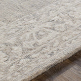 Roessleville Cream Wool Area Rug - Ornate Home
