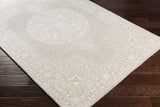 Roessleville Cream Wool Area Rug - Ornate Home