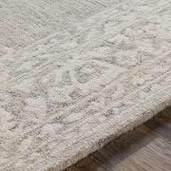 Roessleville Cream Wool Area Rug - Ornate Home