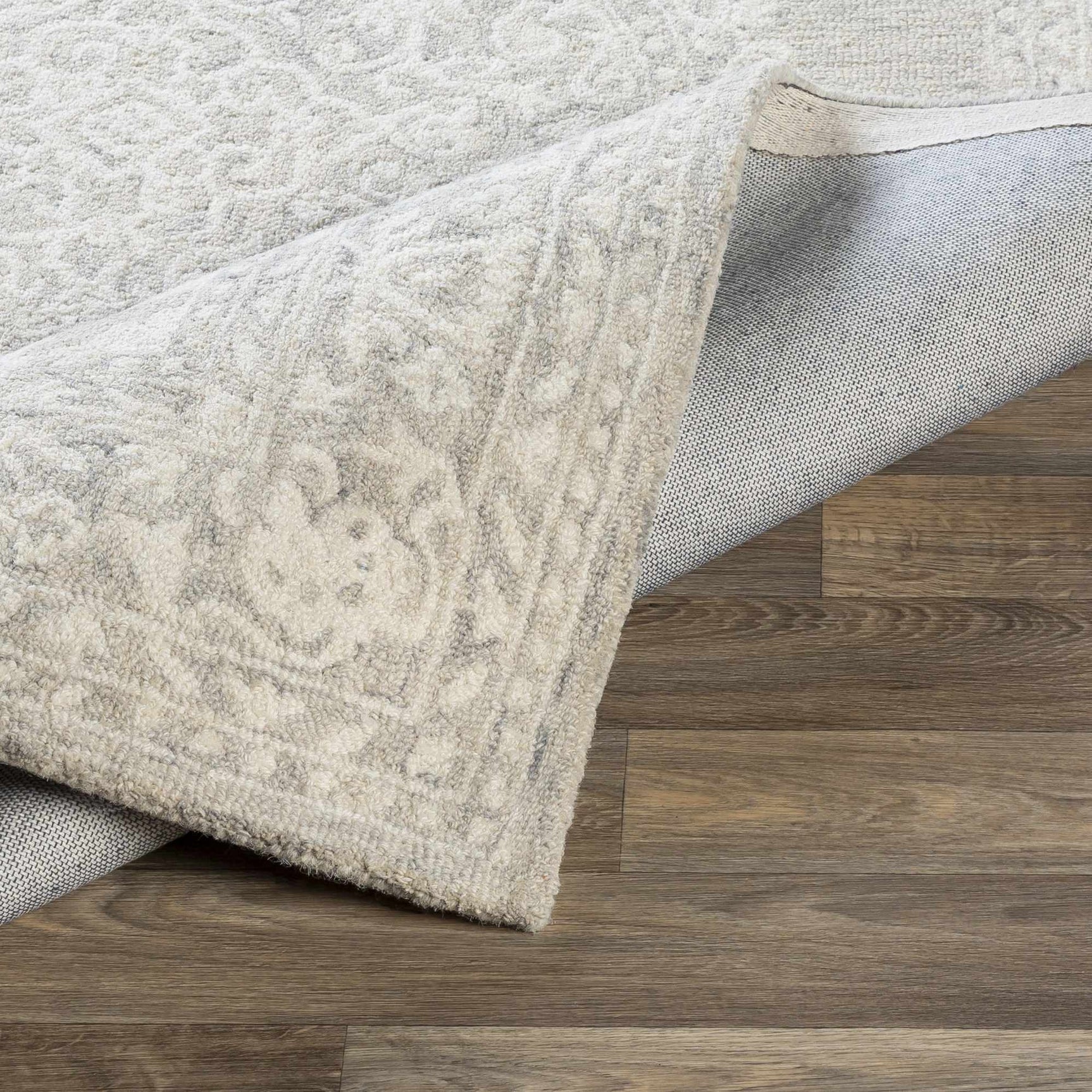 Roessleville Cream Wool Area Rug - Ornate Home