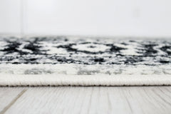 Serang Gray/Black 5' X 7' Area Rug - Ornate Home