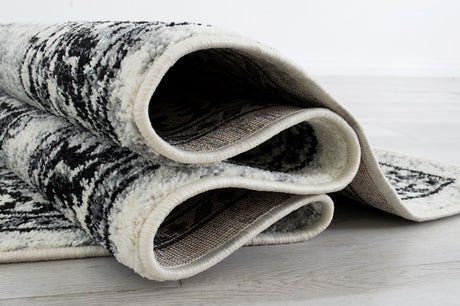 Serang Gray/Black 5' X 7' Area Rug - Ornate Home