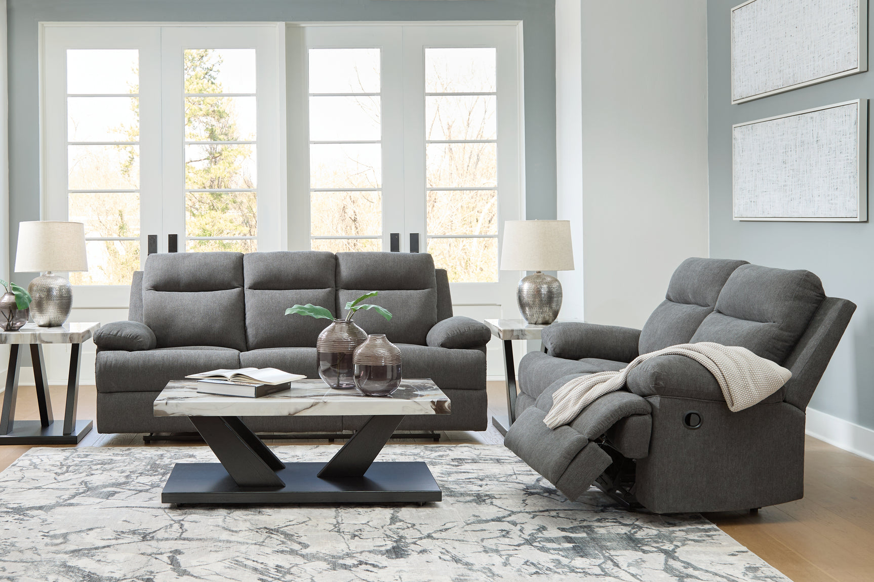 Side-Swipe Charcoal Reclining Sofa and Loveseat - Ornate Home