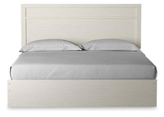 Stelsie White King Panel Bed, Dresser, Mirror, Chest and 2 Nightstands - Ornate Home