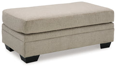 Stonemeade Taupe Ottoman - Ornate Home