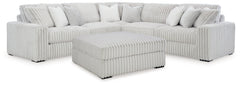 Stupendous Alloy 3-Piece Sectional and Ottoman - Ornate Home