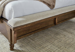 Sturlayne Brown California King Upholstered Panel Bed - Ornate Home