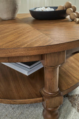 Chadworth Medium Brown Round Cocktail Table (Online Special Price)