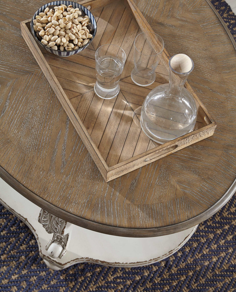 Realyn White/Brown Oval Coffee Table
