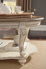 Realyn White/Brown Oval Coffee Table - Ornate Home