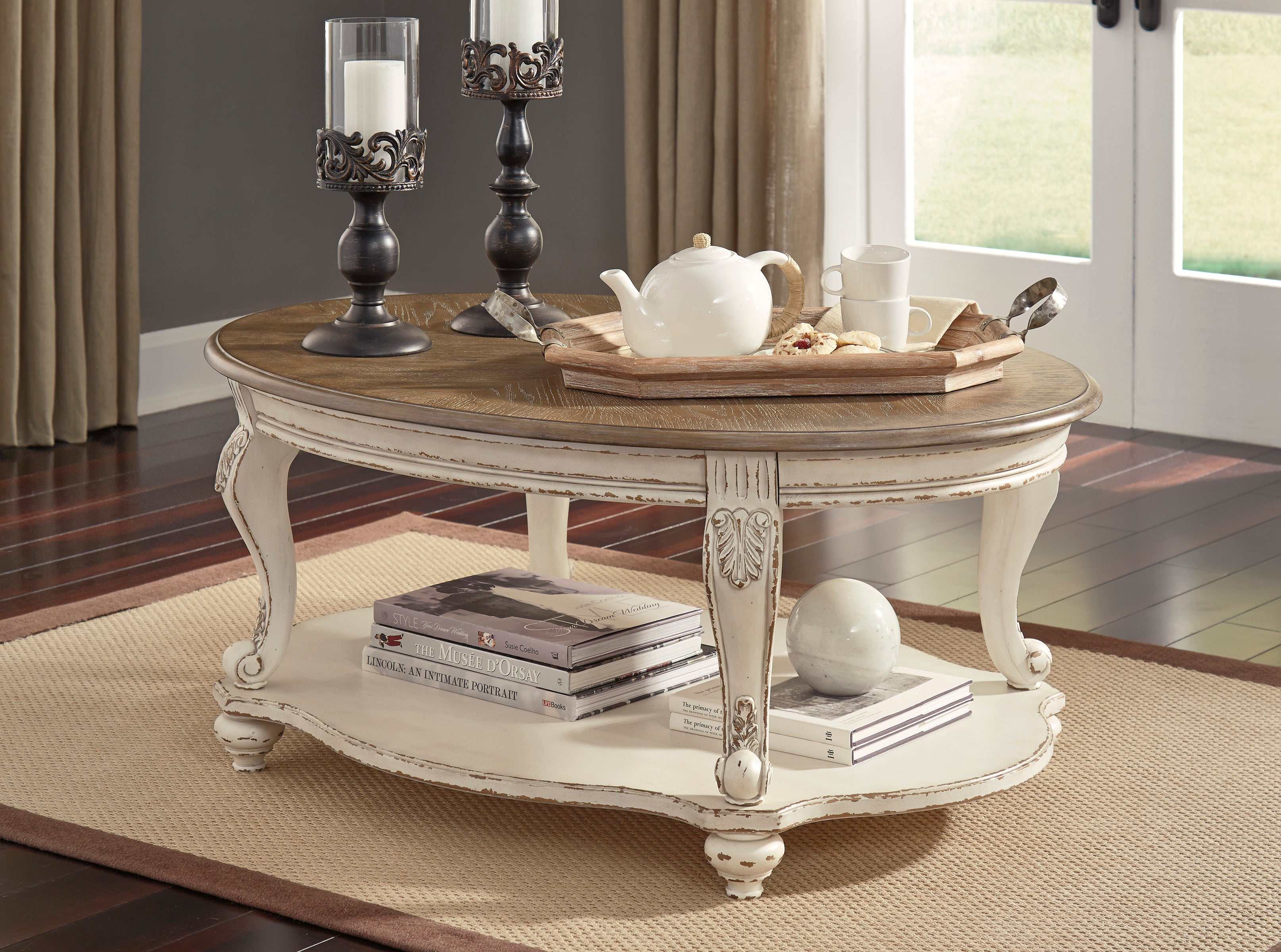 Realyn White/Brown Oval Coffee Table - Ornate Home