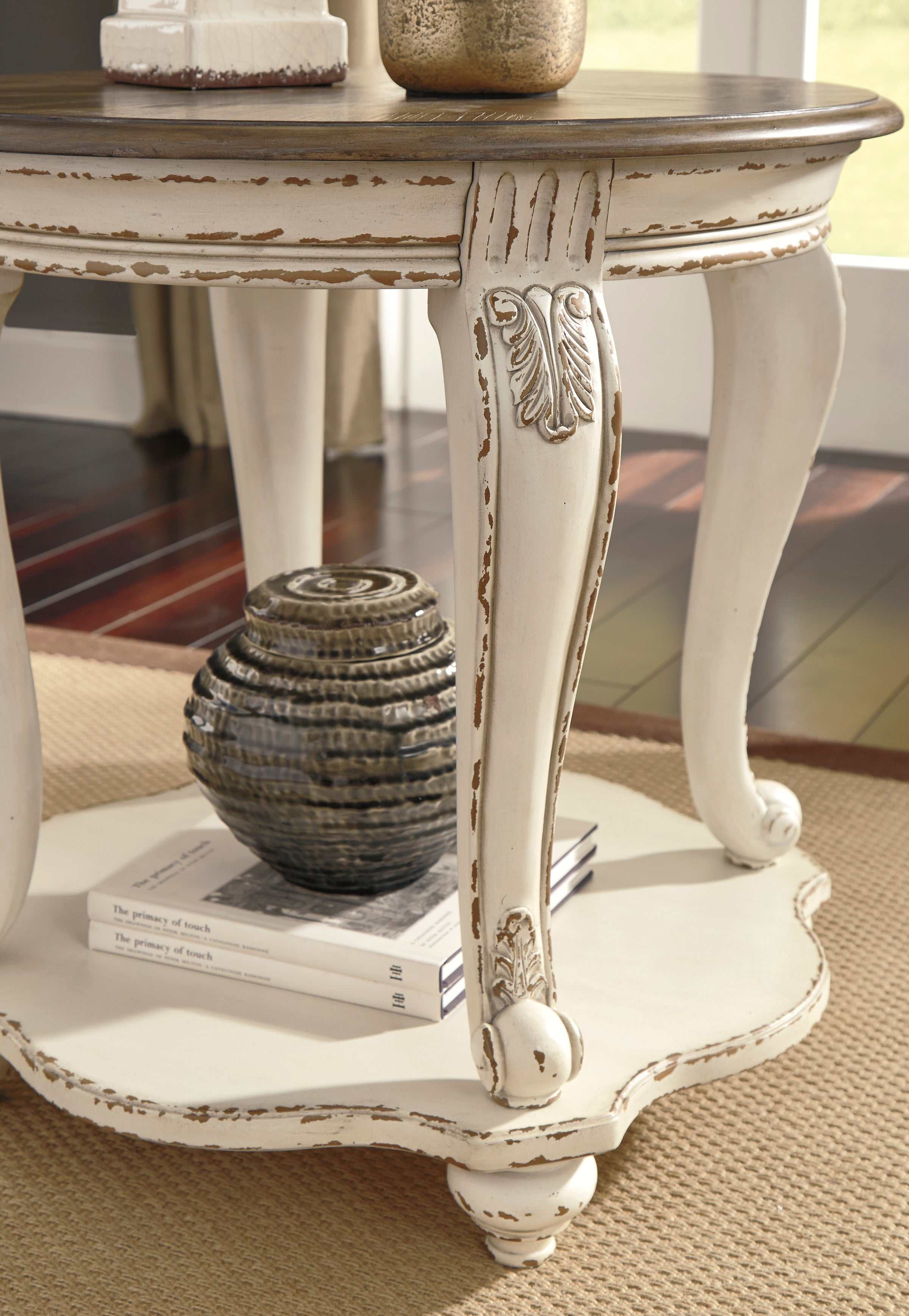 Realyn White & Brown Round End Table - Ornate Home