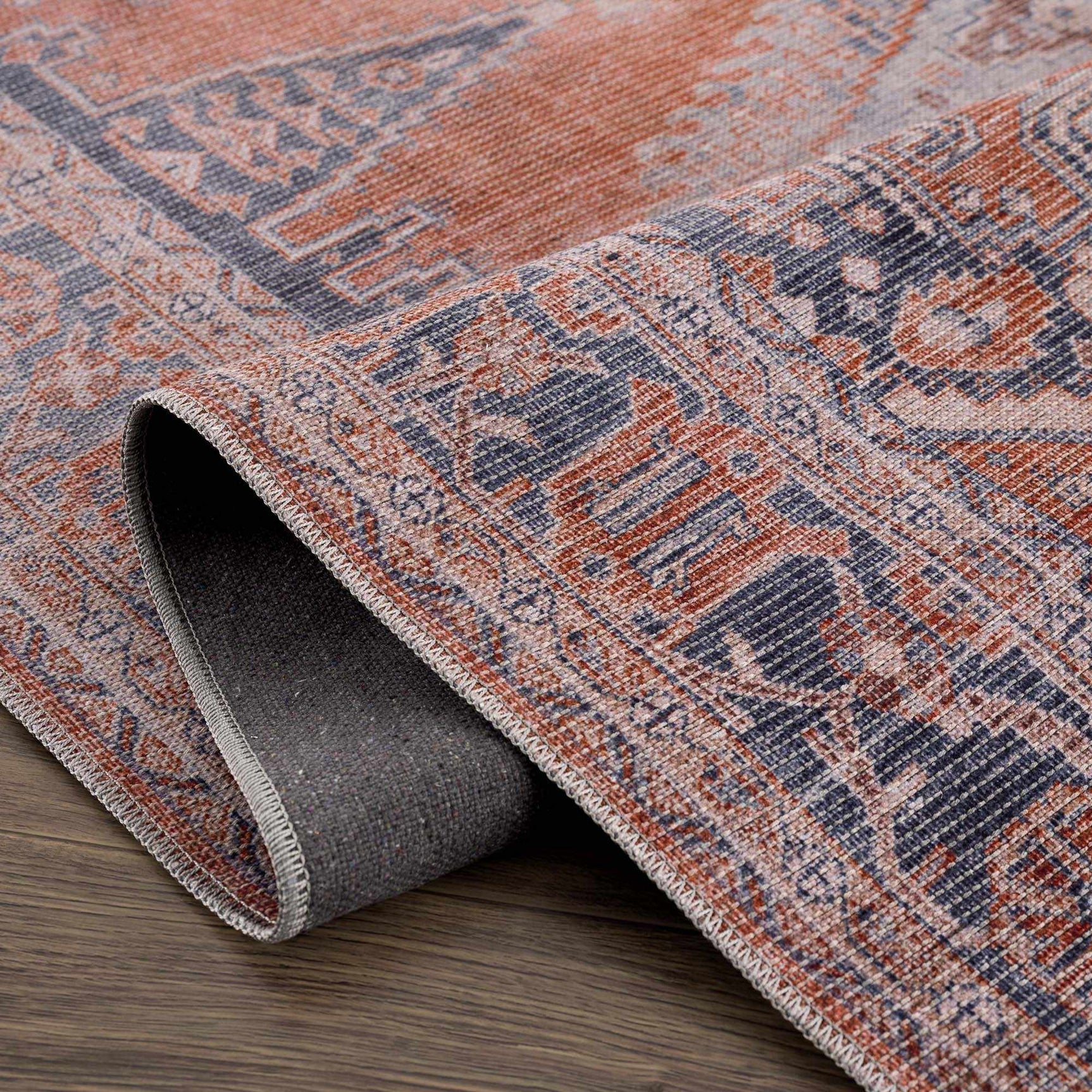 Taber Burnt Orange Washable Rug - Ornate Home
