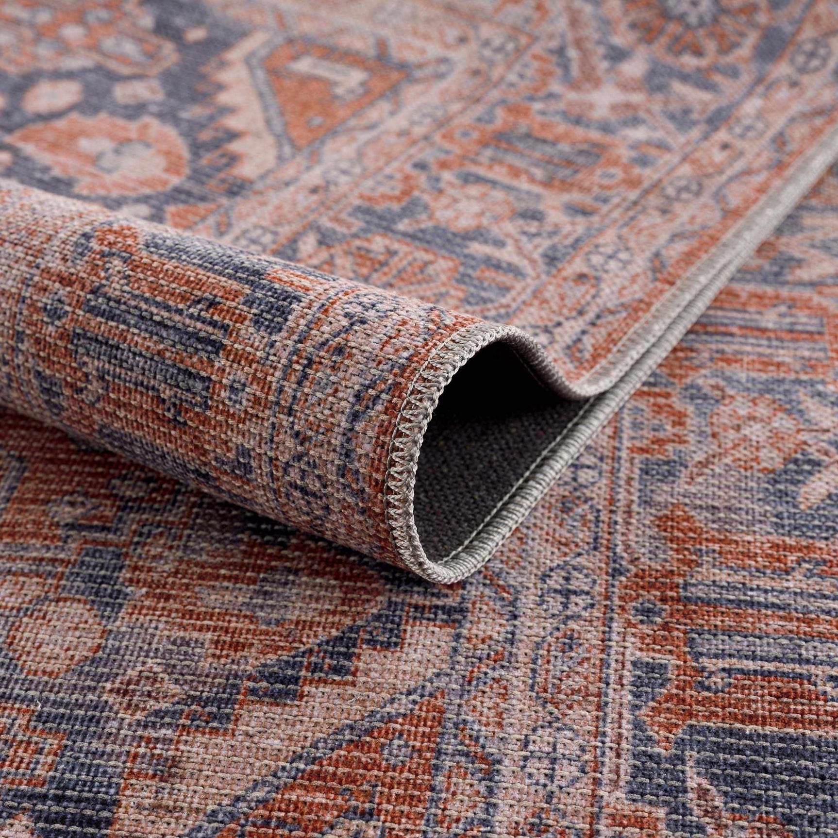 Taber Burnt Orange Washable Rug - Ornate Home