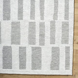 Teige Ivory Area Rug - Ornate Home