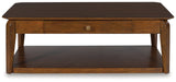 Trenmour Medium Brown Rectangular Cocktail Table (Online Special Price) - Ornate Home