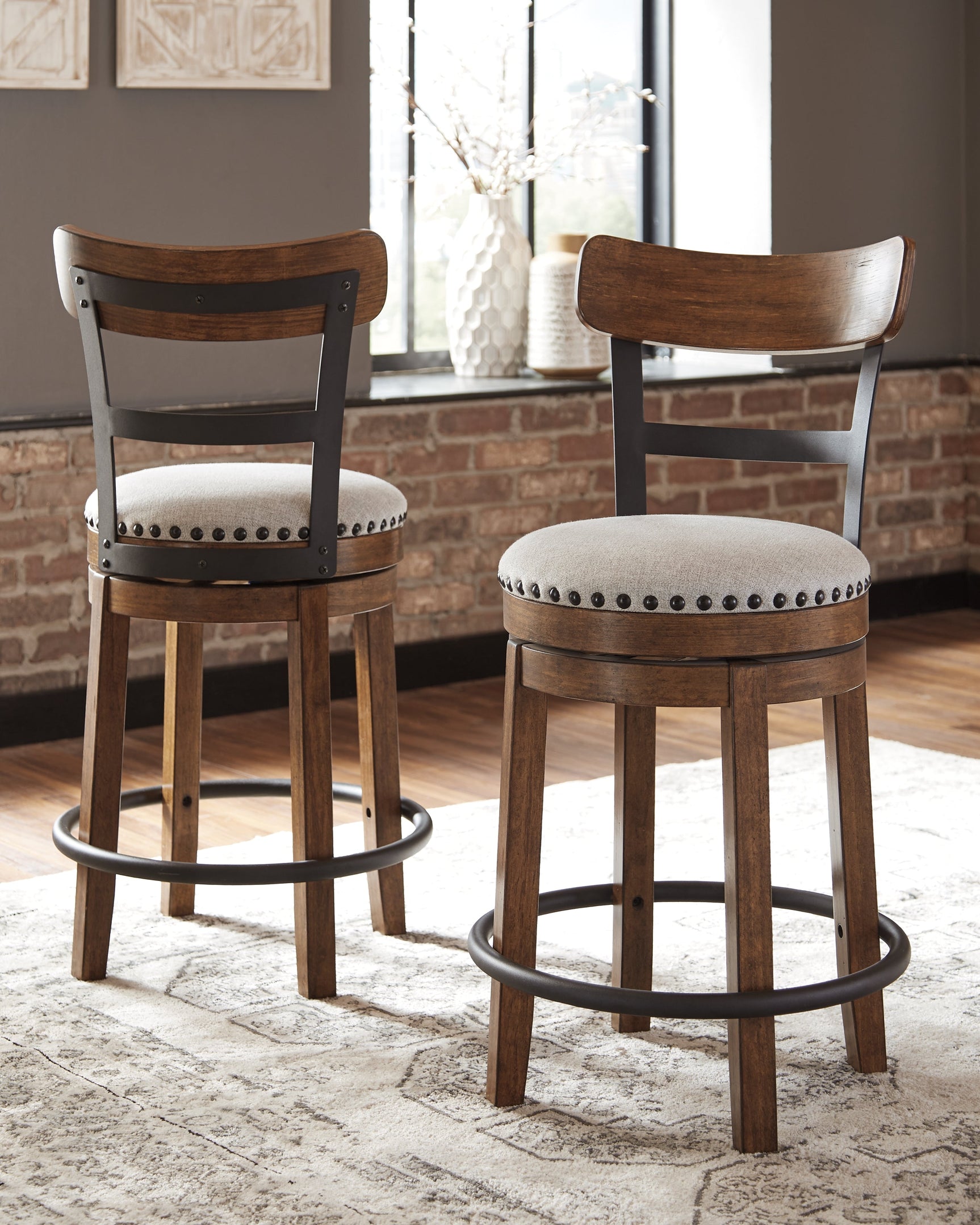 Valebeck Brown UPH Swivel Barstool (1/CN) - Ornate Home