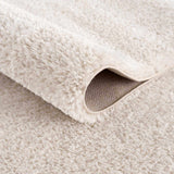 Velora Light Beige Wavy Abstract Modern Minimalist Polyester Machine Woven Area Rug - Clearance - Ornate Home